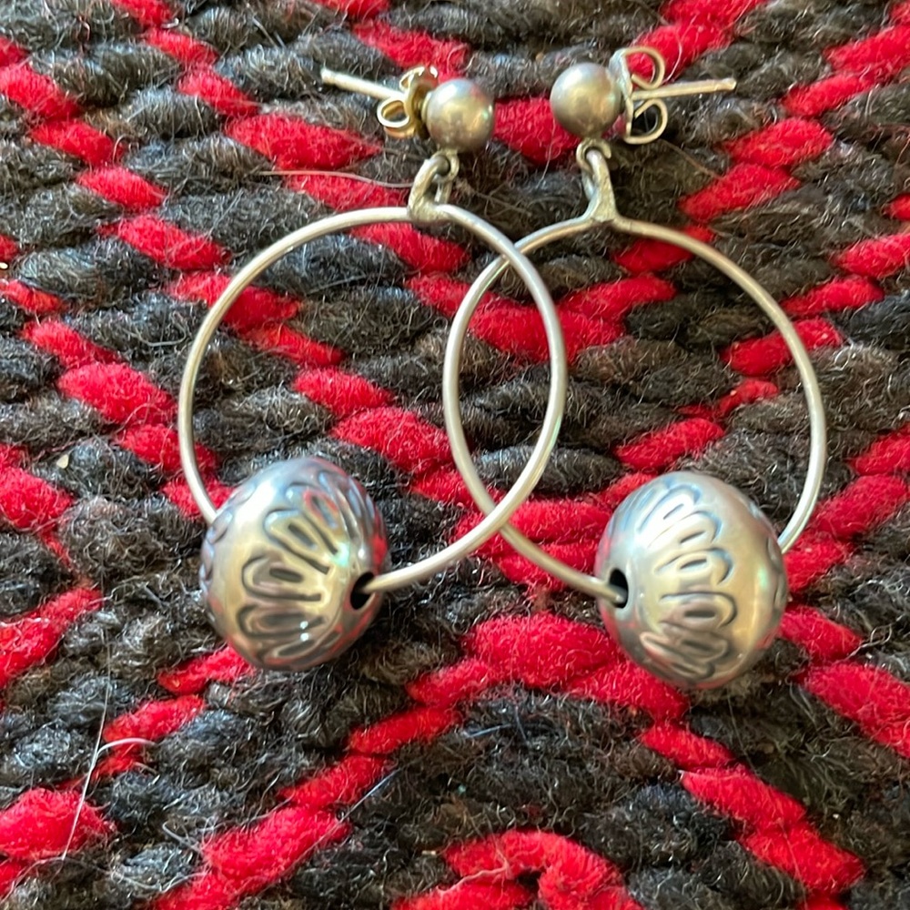 Sterling Navajo-made hoop earrings with stamped beads